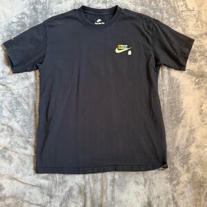 Nike Men's Black Tee with Colorful Logo